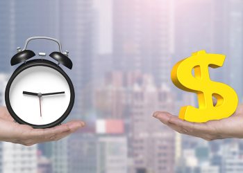 Dollar sign and alarm clock with two hands