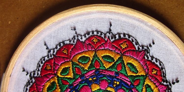 Where Cross-Stitching, Picture Cross Puzzles and Programming Intersect