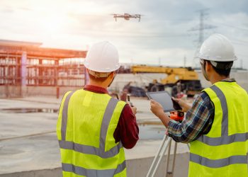 Drone operated by construction worker.