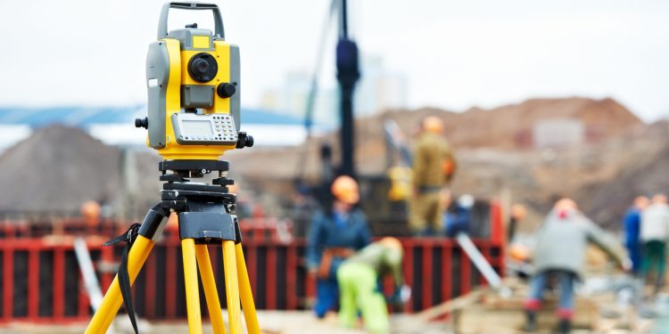 surveyor equipment theodolite at construction site