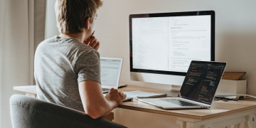 A man researching data on computers