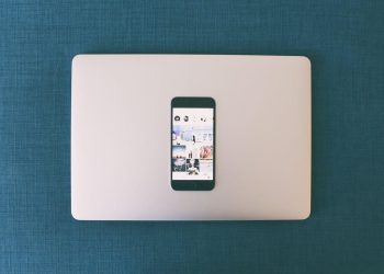 Free Space Gray Iphone 6 on Macbook Stock Photo